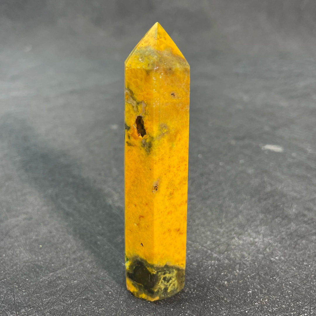 Vibrant yellow Bumblebee Jasper Crystal Tall Tower with black banding for solar plexus energy and confidence.