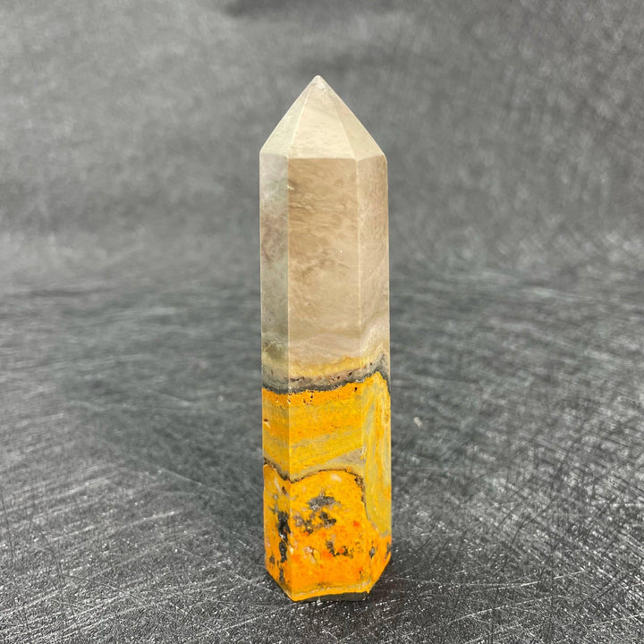 Bumblebee Jasper Crystal Tall Tower with vibrant yellow, orange, and grey banding for solar plexus energy.