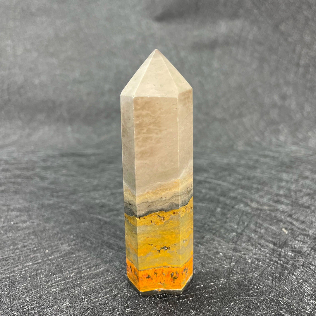 Bumblebee Jasper Crystal Tall Tower with vibrant yellow, orange, and grey bands for solar plexus energy.