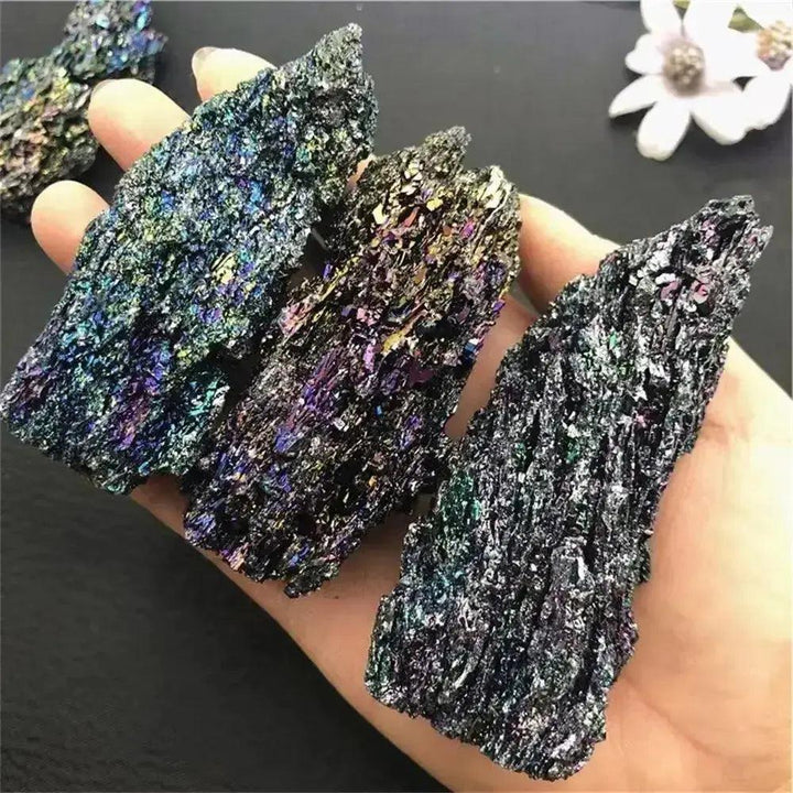 Carborundum Silicon Carbide Crystal Specimen Rainbow, raw iridescent pieces displaying deep blues, violet, gold, and green.