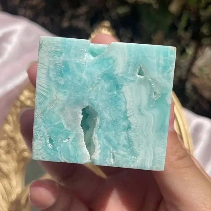 Caribbean Blue Calcite Crystal Cube from Crystal Destiny, featuring calming blue and white swirls.