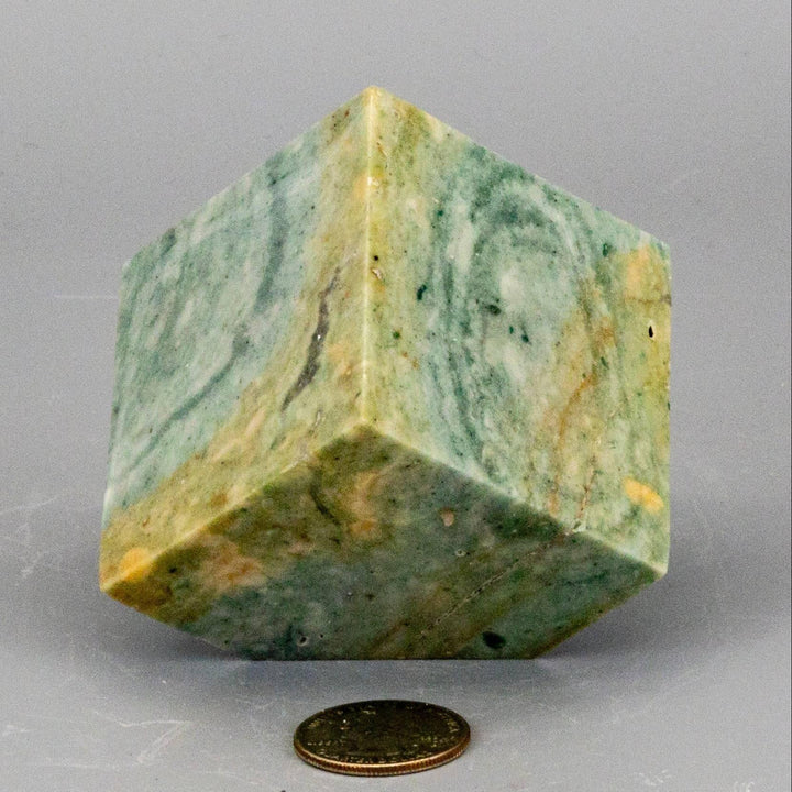 Caribbean Calcite Cut Corner Cube, 2.25" aqua and teal crystal with white/brown banding, evoking tropical water.