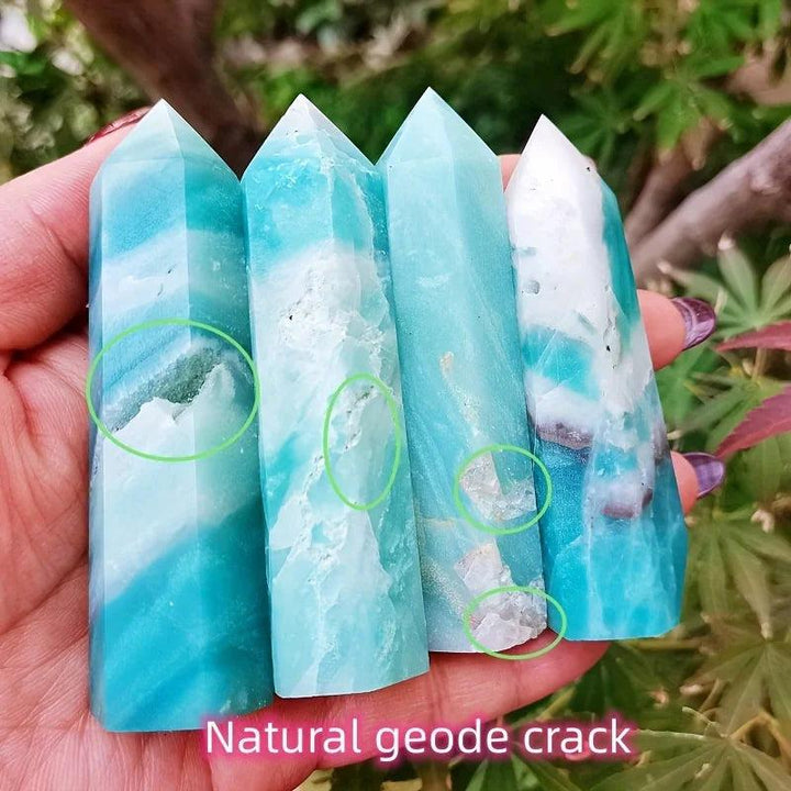 Natural sky blue quartz columns with white geode cracks for healing and home decor.