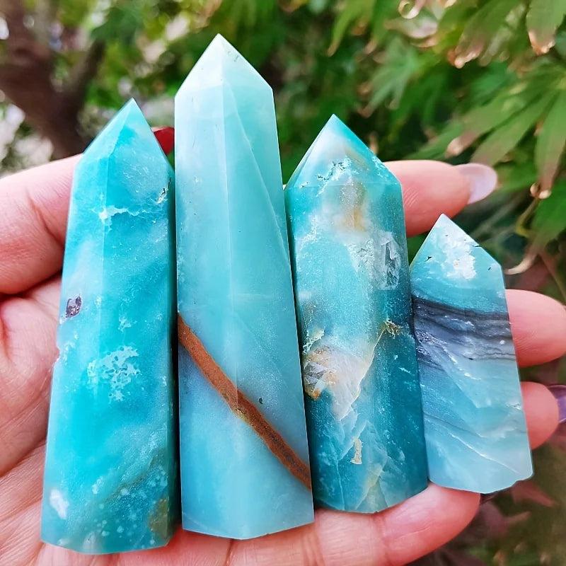 Polished sky blue quartz columns with natural mineral inclusions, perfect for healing home decor.