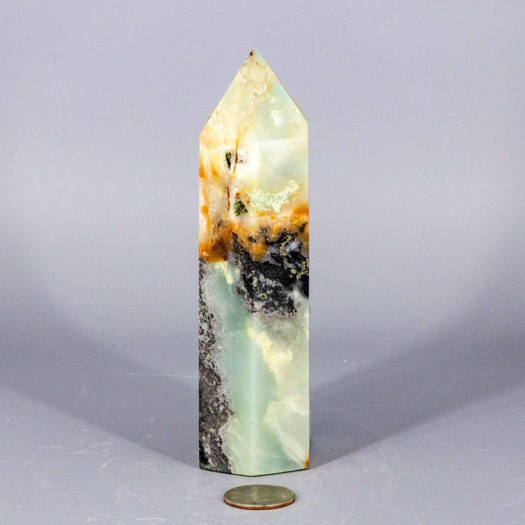 XXL polished Caribbean Calcite tower with soft blue, white, and brown banding, supporting calm communication and emotional clarity.