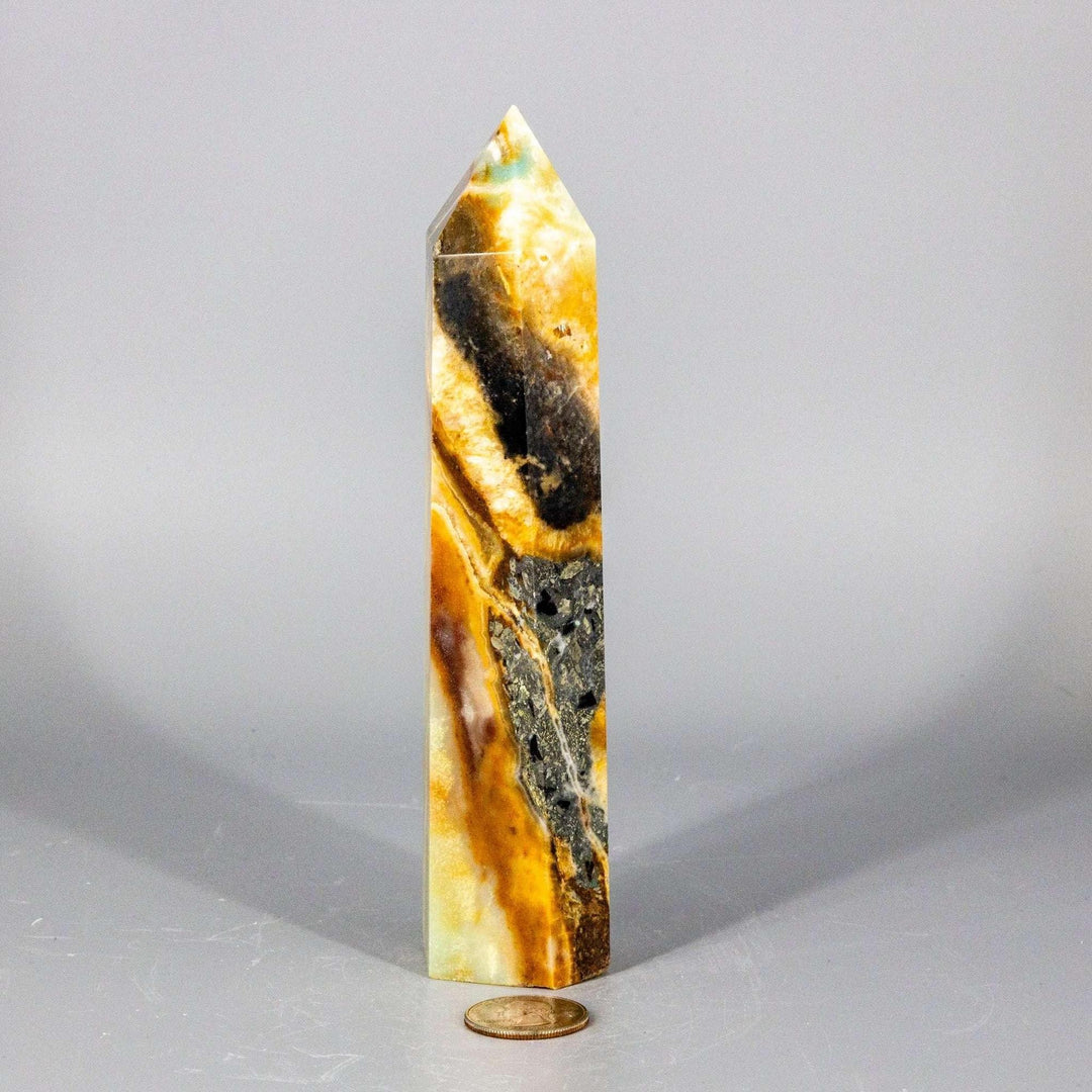 XXL Caribbean Calcite Tower: Polished crystal with soft blue, white Aragonite, and warm brown matrix for clarity and inner knowing.