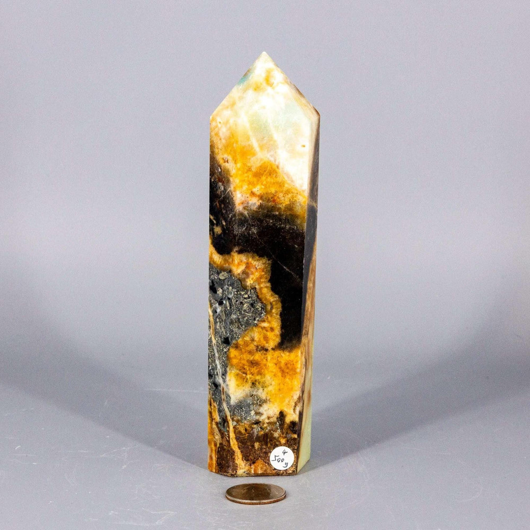 XXL Caribbean Calcite Tower with striking blue, white, and brown banding, promoting calm and emotional clarity.