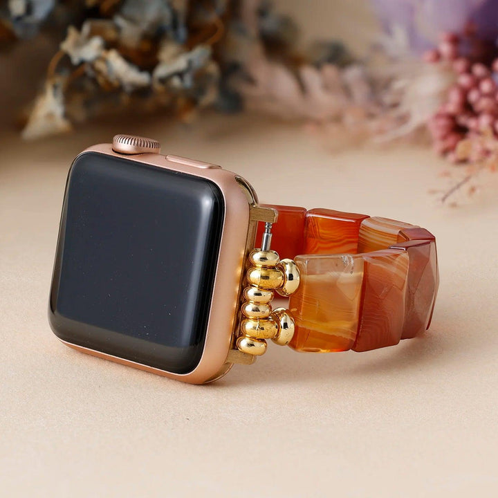 Warm orange Carnelian Agate crystal beaded stretch smartwatch strap with gold accents, boosting energy and vitality.