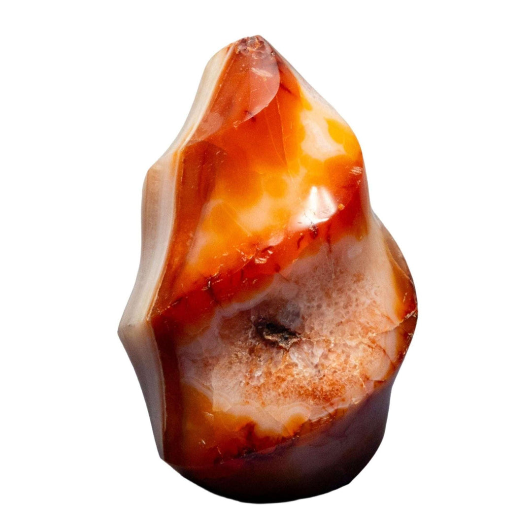 Hand-carved Carnelian Agate Flame with warm orange-red hues, natural banding, and translucent layers.