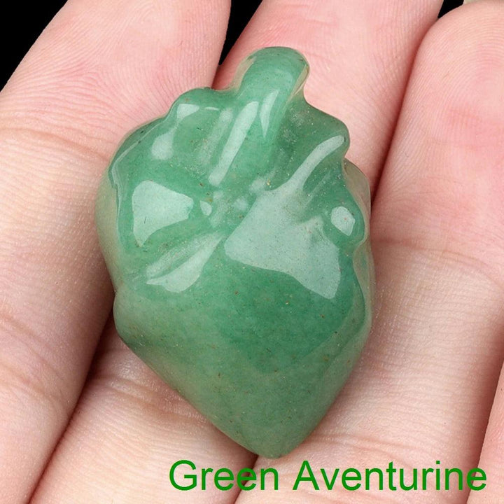 Green Aventurine mini human heart model crystal sculpture, a carved love stone for reiki and chakra decor.