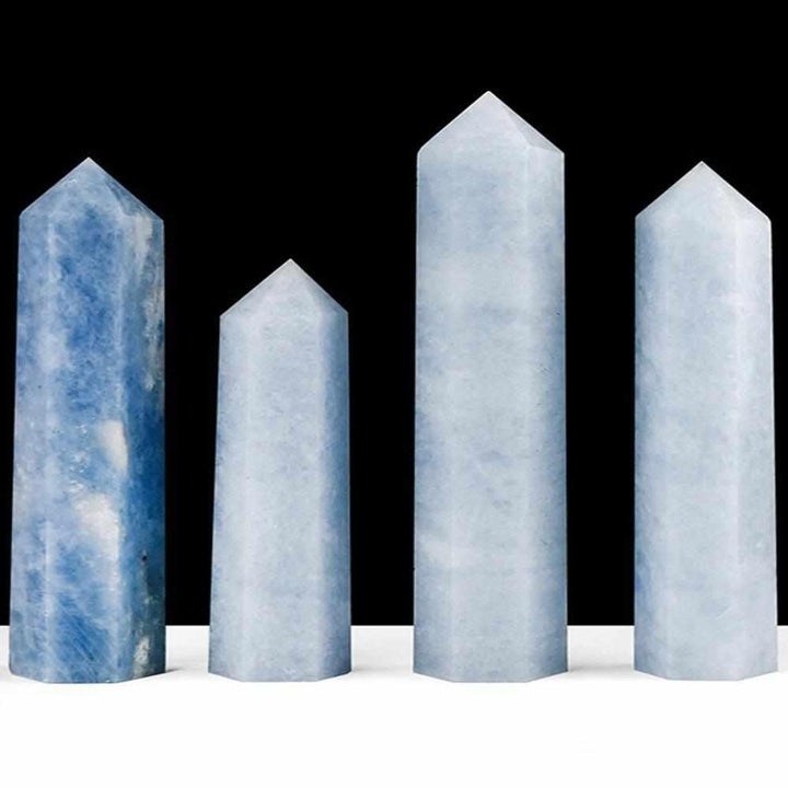 Four pale blue Celestite crystal towers with single-terminated points for calming, high-vibration energy.