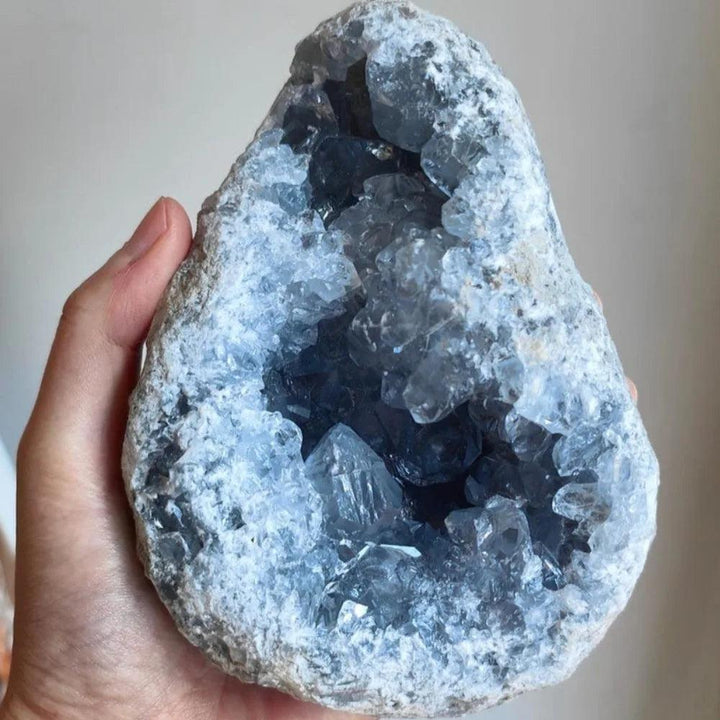 Large natural sky blue Celestite geode cluster with raw druzy crystals for peaceful home decor and sleep healing.