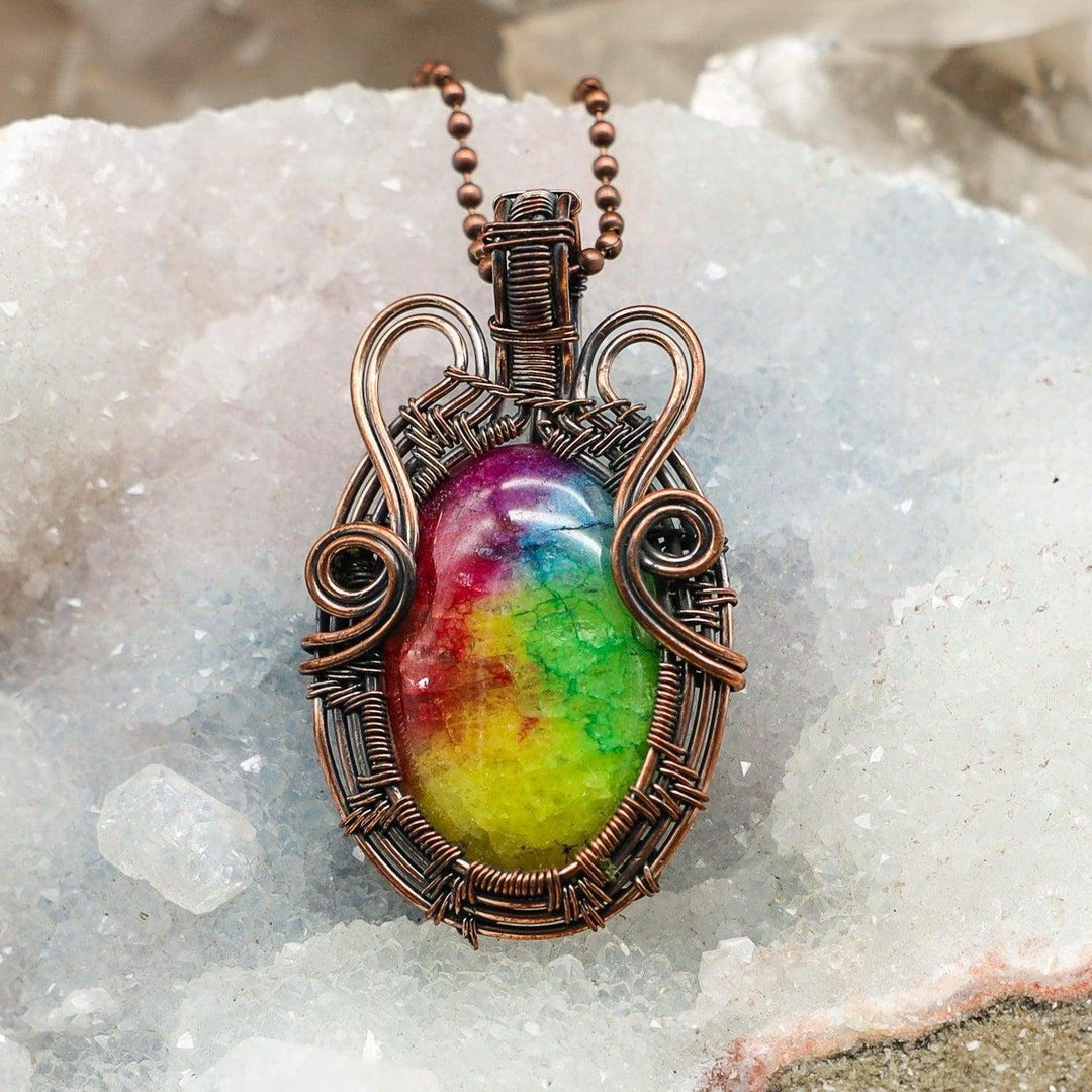 Chakra Agate Wire Wrap Crystal Pendant with vibrant, full-spectrum color banding in handcrafted copper for energy balance.