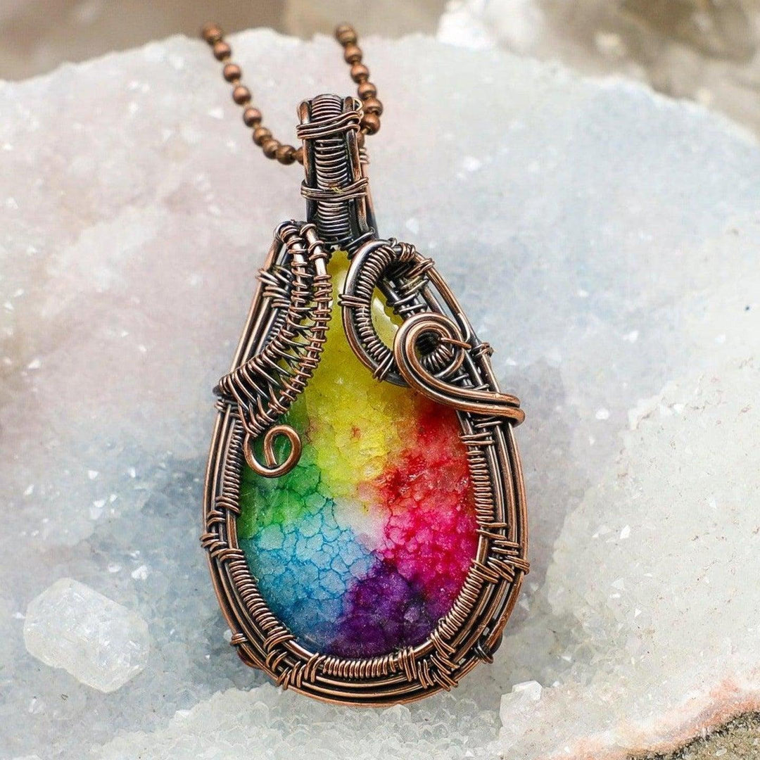 Chakra Agate Wire Wrap Crystal Pendant with vibrant seven-color banding in handcrafted copper for full-spectrum alignment.