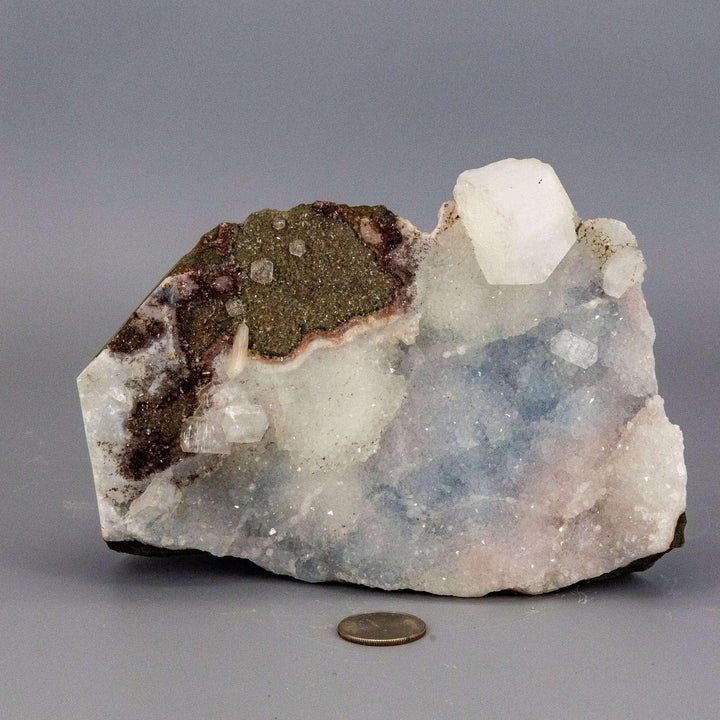 Calm blue-grey Chalcedony Quartz Cluster with a striking glassy Apophyllite knob, showcasing serene beauty.