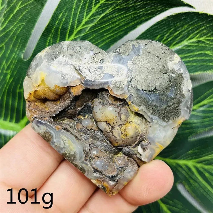 Chalcopyrite Agate geode heart by Crystal Destiny, showcasing iridescent druzy crystals and natural banding.