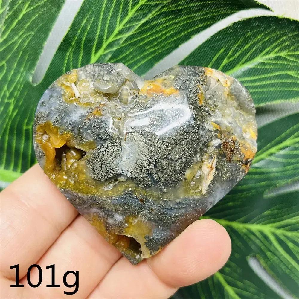 Chalcopyrite Agate geode heart by Crystal Destiny, with iridescent druzy, gold, grey, and white banding.