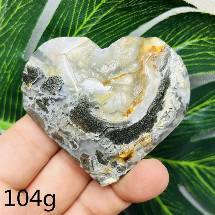 Chalcopyrite Agate geode heart by Crystal Destiny, with iridescent druzy, natural banding, and peacock colors.