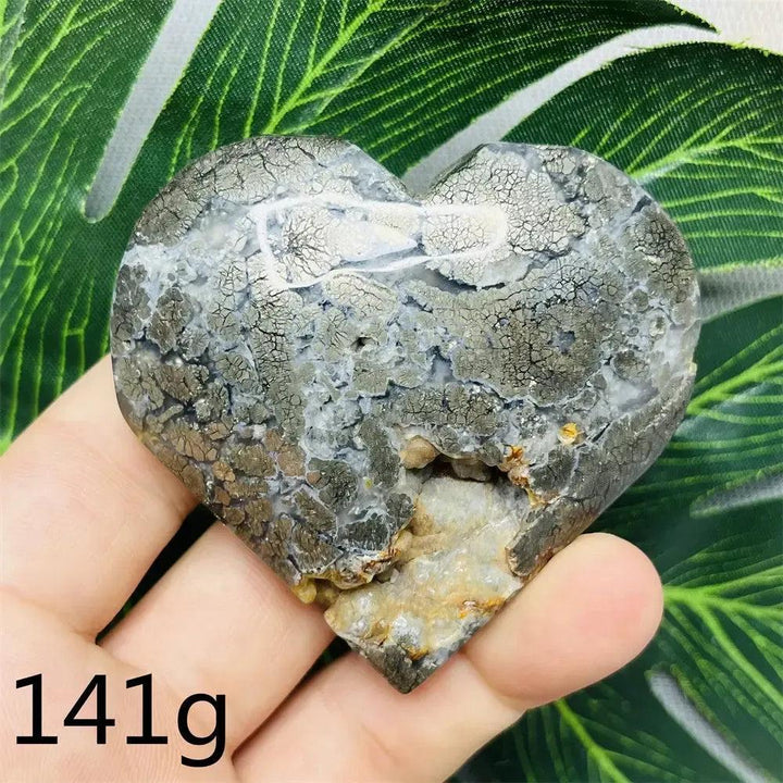 Chalcopyrite Agate geode heart by Crystal Destiny, showing metallic iridescence, druzy crystals, and agate banding.