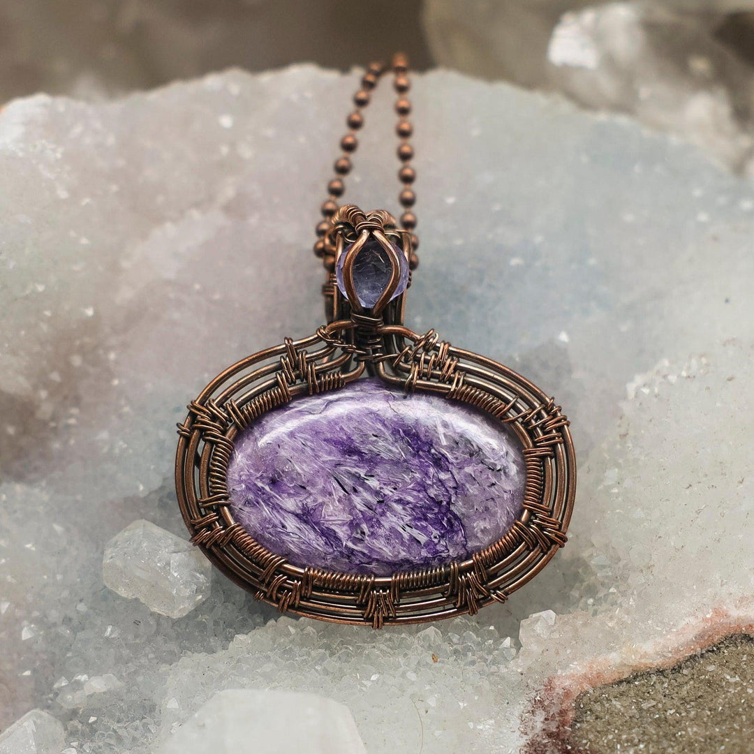 2-inch Charoite Wire Wrap Pendant with swirling violet-purple stone in handcrafted healing copper.