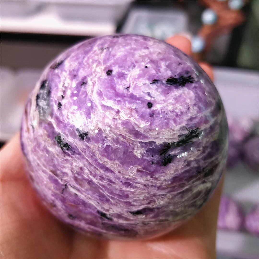 Rare Charoite crystal sphere with swirling violet and lavender patterns, perfect for spiritual growth and inner wisdom.