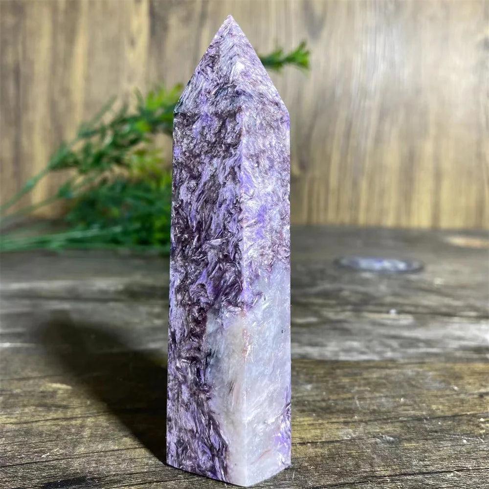 Rare Charoite Crystal Tower with deep swirling violet, white, and lavender patterns, focusing Crown Chakra energy.