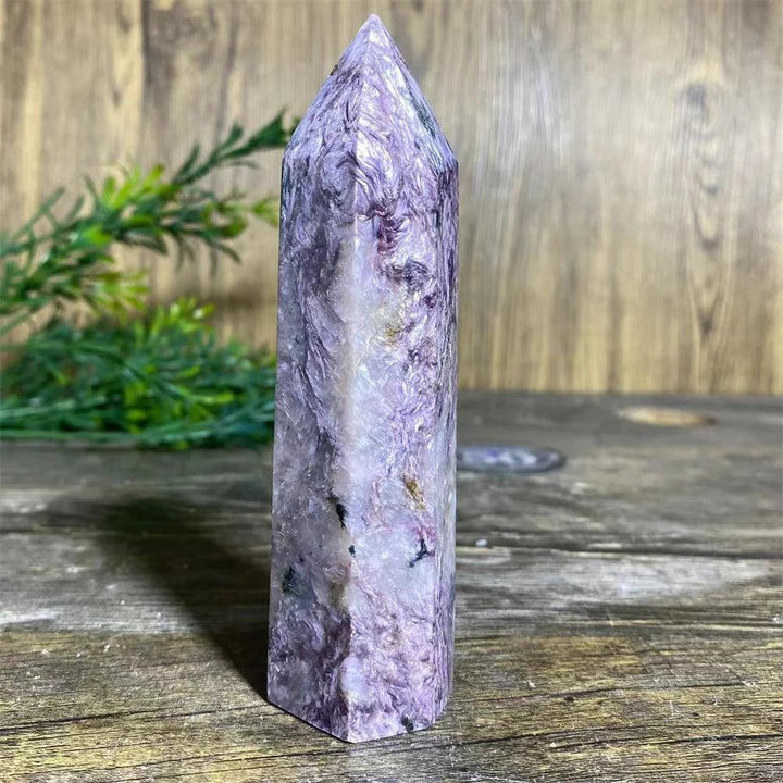 Charoite Crystal Tower: Deep, swirling violet natural stone wand with white and lavender patterns, focusing Crown Chakra energy.