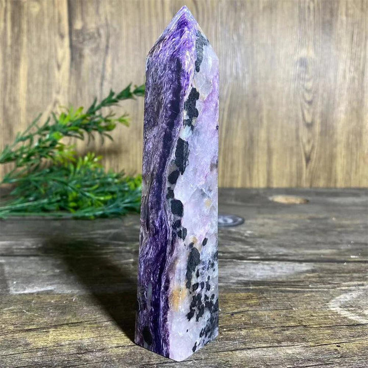 Charoite Crystal Tower: Deep swirling violet, white, and black natural stone wand specimen. Crown Chakra energy.