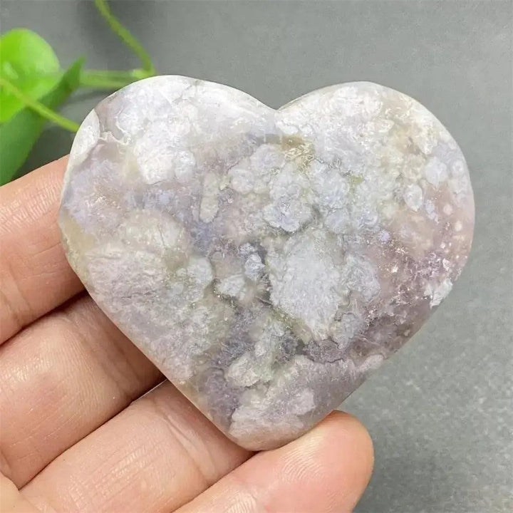 Cherry Blossom Agate Heart: Hand-polished pink and white crystal heart, promoting emotional healing and self-love.