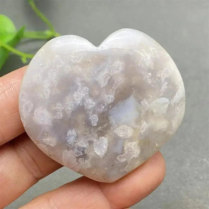 Cherry Blossom Agate Heart: Hand-polished, delicate pink and white stone with floral inclusions for emotional healing.