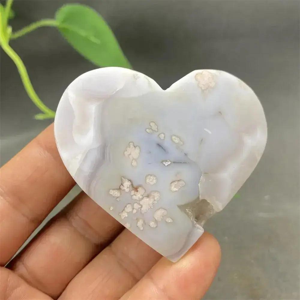 Cherry Blossom Agate Heart: Hand-polished, delicate pink and white floral patterns, promoting emotional healing and self-love.