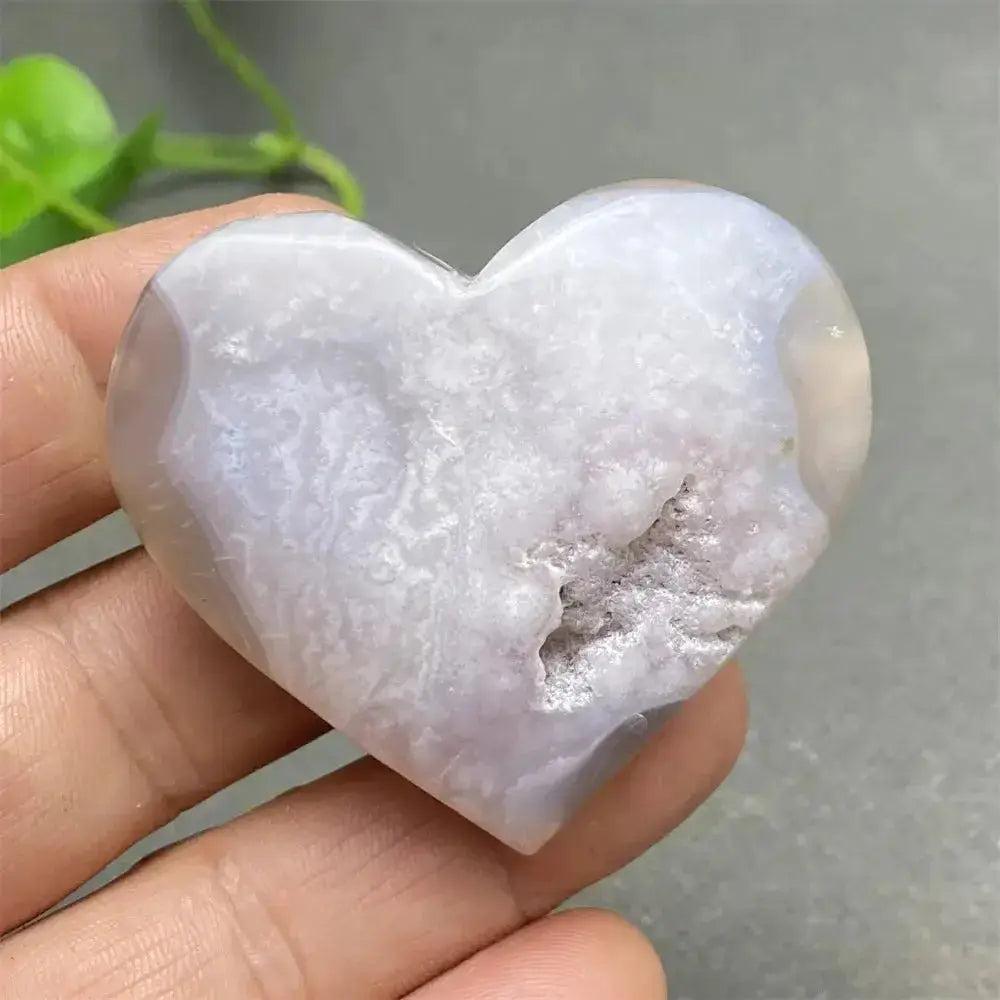 Cherry Blossom Agate Heart: Polished pink and white agate heart, showcasing unique floral inclusions and nurturing energy.