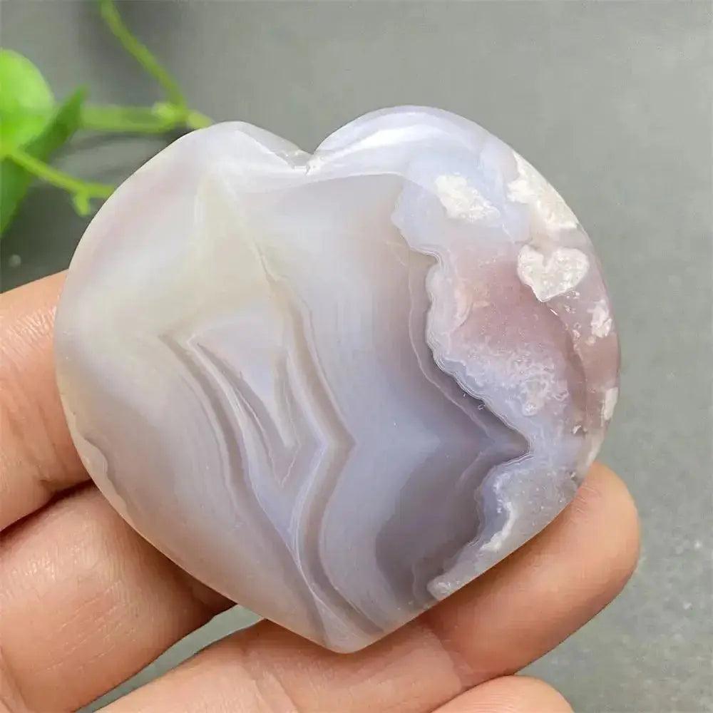 Cherry Blossom Agate Heart: Polished pink and white agate heart, promoting emotional healing and self-love.