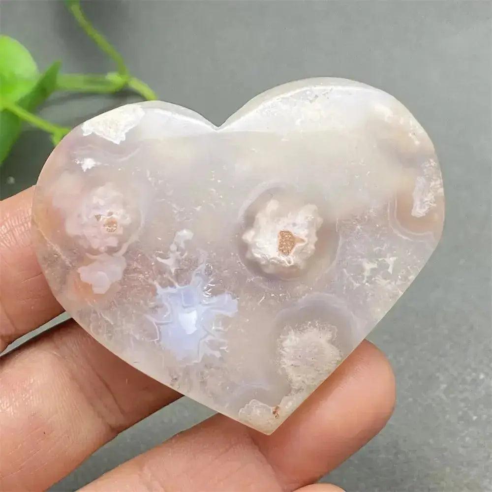 Cherry Blossom Agate heart from Crystal Destiny, featuring delicate pink and white floral patterns.