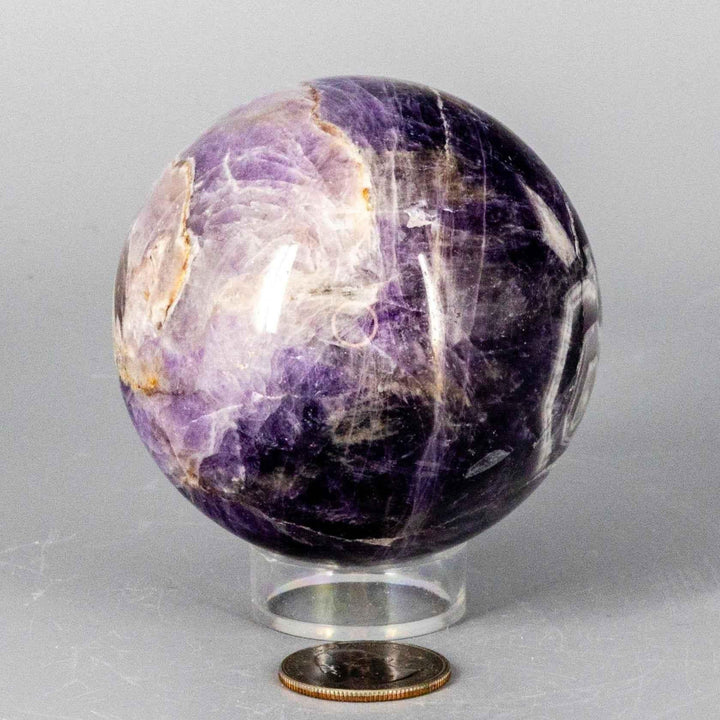Chevron Amethyst Sphere, 58-71MM, showcasing deep violet and white V-shaped banding for enhanced calming and intuition.