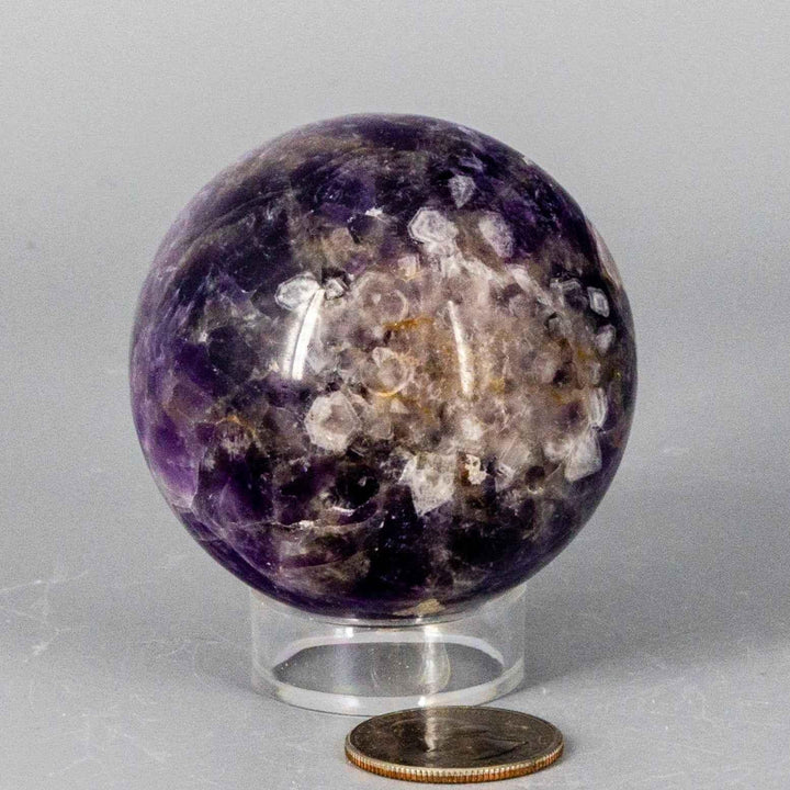 Chevron Amethyst Sphere, 58-71MM, showcasing deep violet Amethyst and white Quartz V-shaped banding.