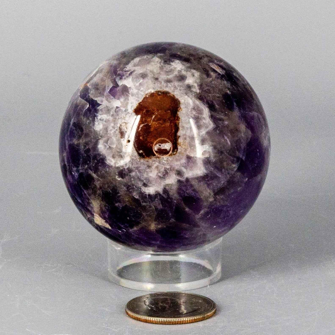 Chevron Amethyst Sphere 58-71MM, radiating combined energy with deep violet and white Quartz V-shaped banding.