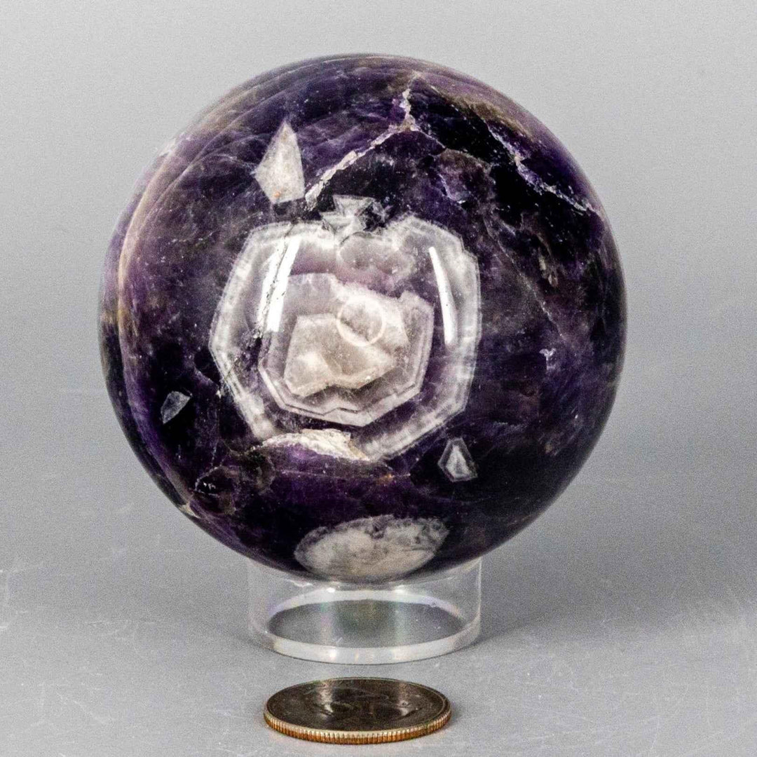 Chevron Amethyst Sphere, 58-71MM, showcasing deep violet Amethyst and white Quartz V-shaped banding.