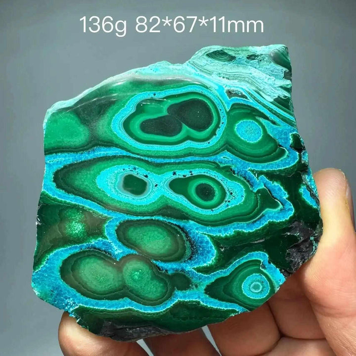 Polished Chrysocolla Malachite slab featuring vibrant blue and green swirls for heart and throat chakra healing.