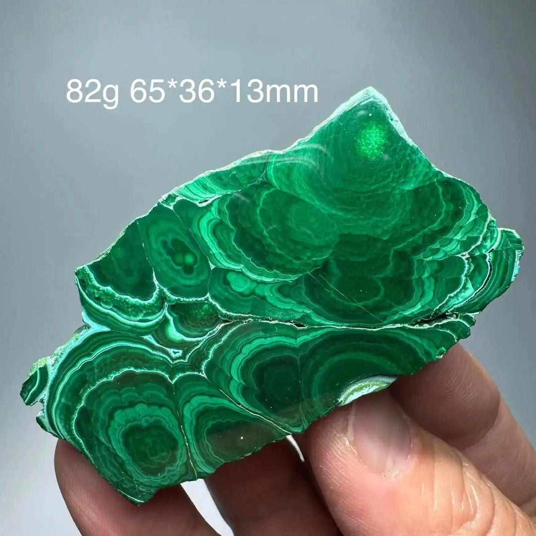 Polished Chrysocolla Malachite slab with vibrant green banded swirls for heart chakra healing and desk display.