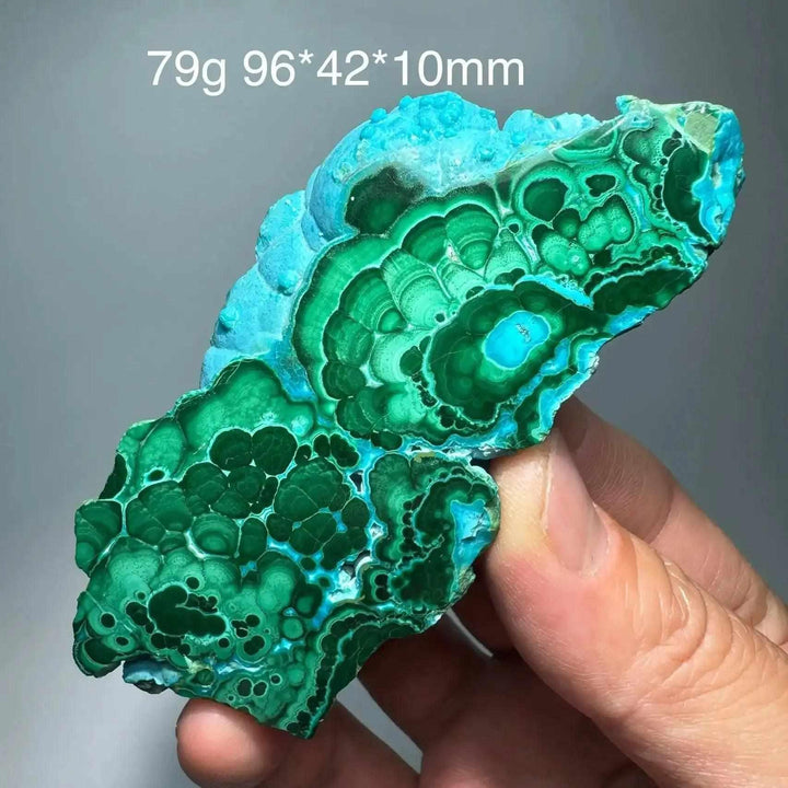 Polished Chrysocolla Malachite slab featuring vibrant blue and green swirls for heart and throat chakra healing.