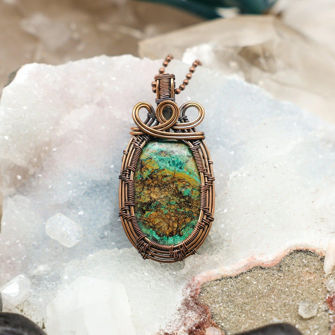 Chrysocolla Oval Wire Wrap Pendant, 2.65" handcrafted in healing copper, showcasing vivid turquoise and deep blue-green hues.