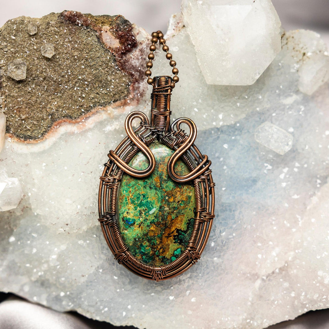 Chrysocolla Wire Wrap Pendant: Swirling blues and greens, handcrafted copper, 2.80-inch, for wisdom and communication.