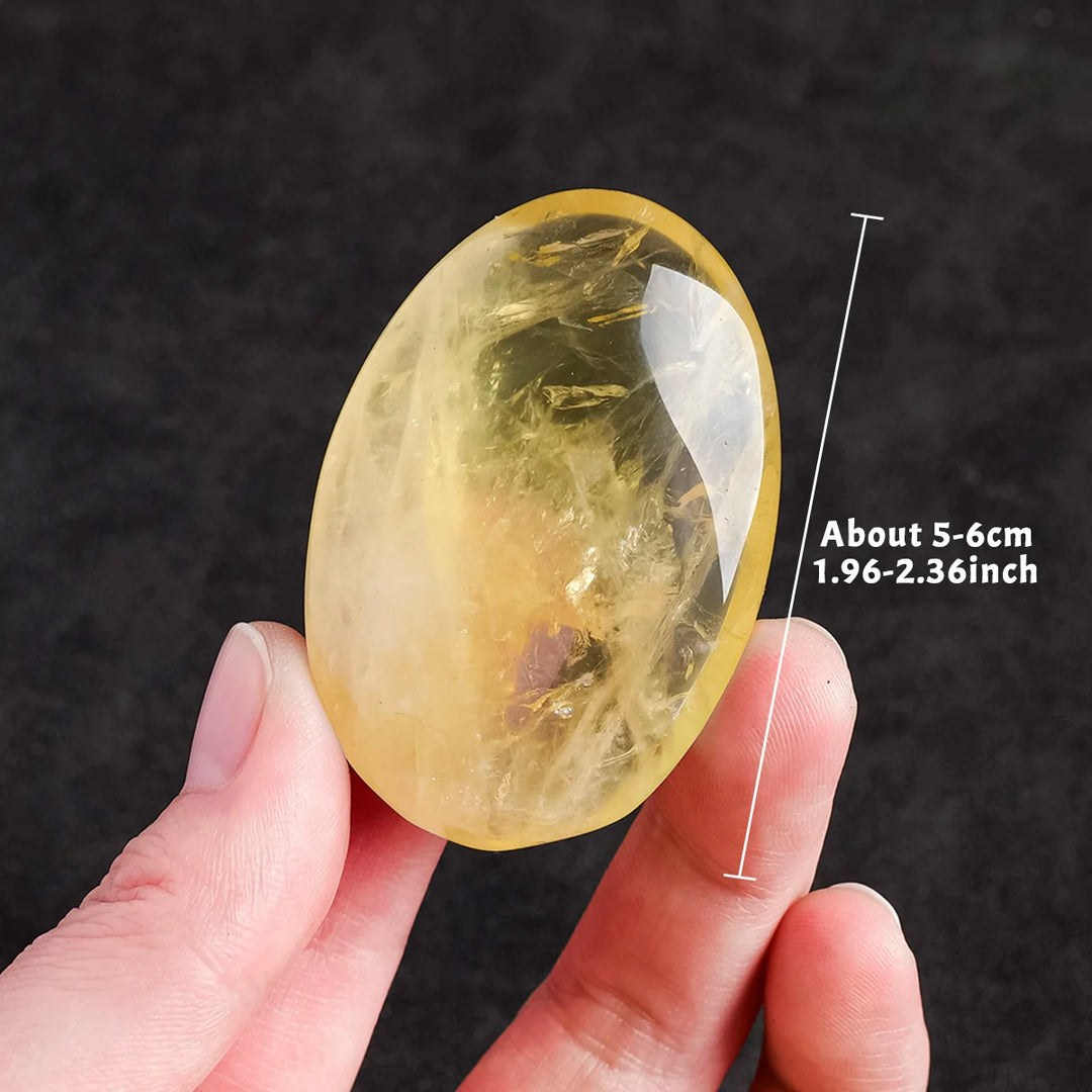 Polished natural citrine palm stone, a 5-6cm yellow quartz crystal for Reiki healing, energy balancing, and home decor.