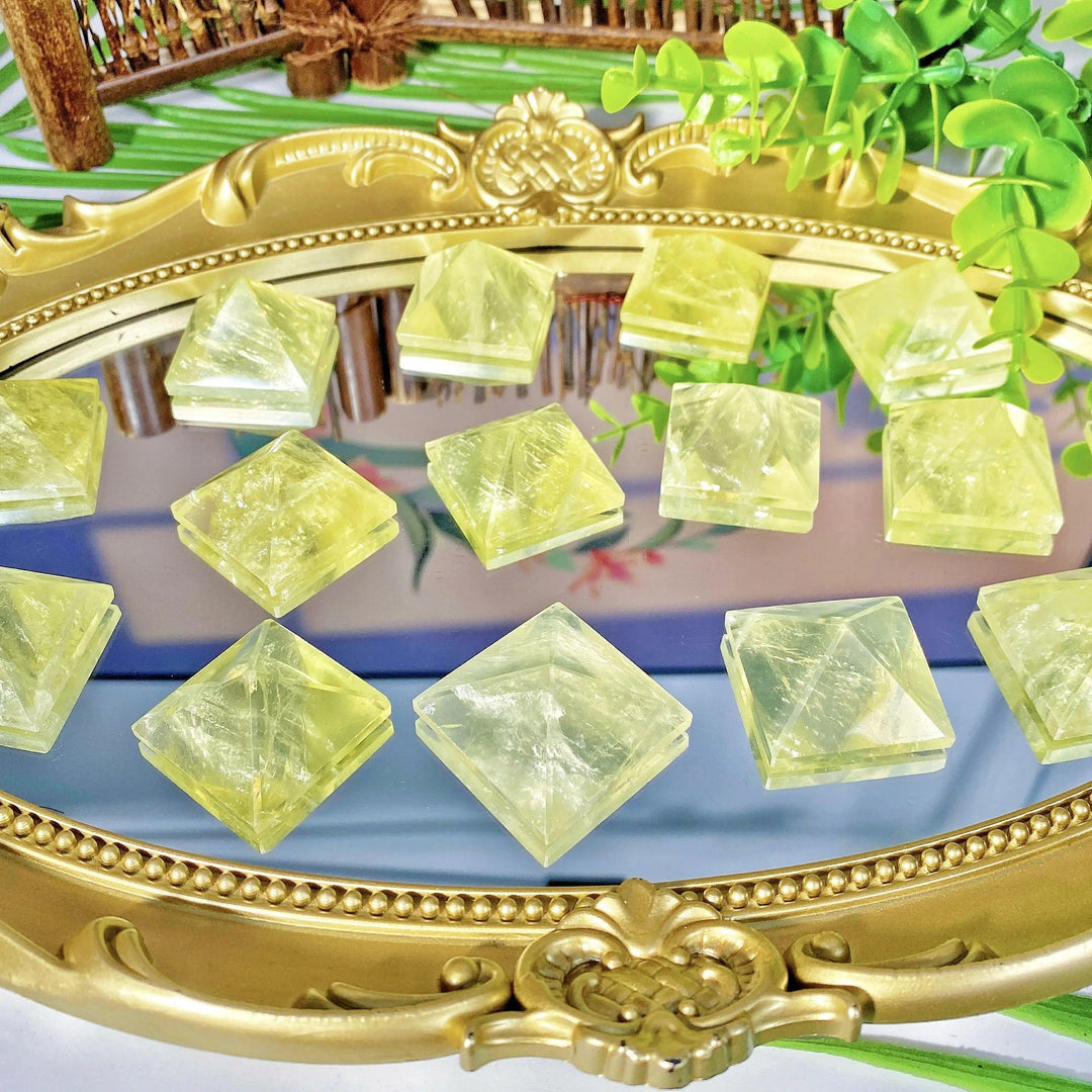 Natural Citrine crystal pyramids with vibrant yellow hues, perfect for healing energy and elegant home decor.