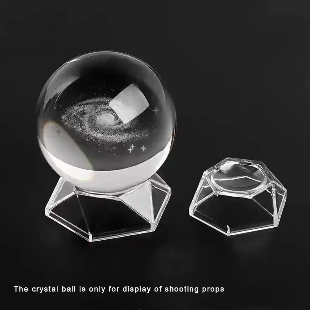 Clear Acrylic Crystal Sphere Display Stand with hexagon base, showcasing a galaxy-engraved crystal ball.
