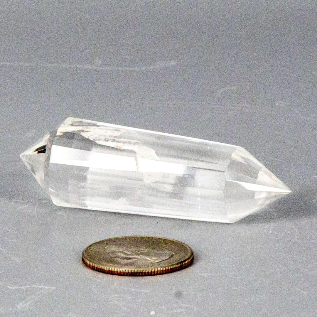 Clear Quartz 24-Faceted Vogel wand, a precision instrument with double termination and a slight white streak.