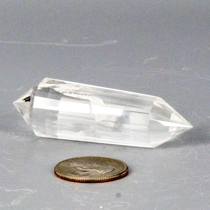 Clear Quartz 24-Faceted Vogel wand, a precision instrument with double termination and a slight white streak.