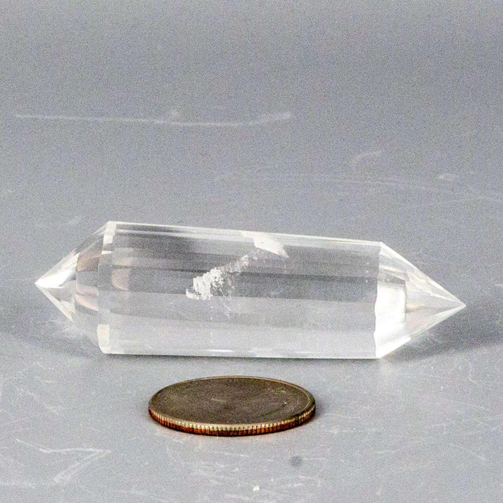 Clear Quartz 24-Faceted Vogel wand, a precision instrument with double termination and a visible white streak.