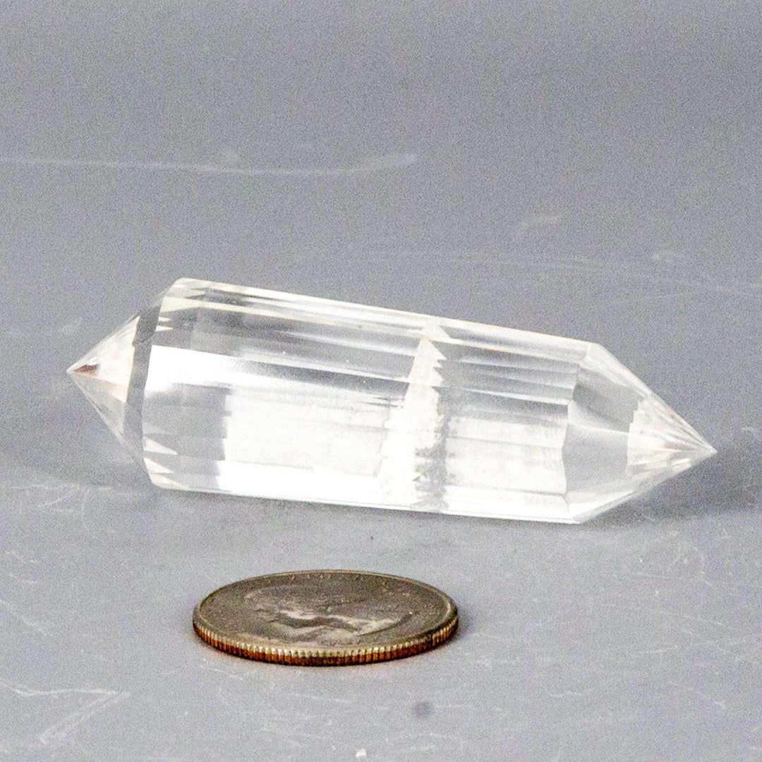 Clear Quartz 24-Faceted Vogel wand, a precision instrument with double termination and precisely angled facets.